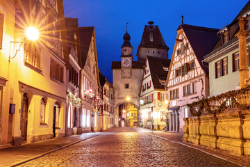 Fototapeta na wymiar Christmas street and Tower Markusturm in medieval Rothenburg ob der Tauber, Bavaria, Germany