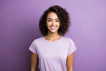 Young Woman Smiling and Wearing a Blank Purple T-shirt Standing in Front of a Violet Background, Print on Demand Template, Fashion Portrait, People Wearing Clothing with Print Copy Space - obrazy, fototapety, plakaty