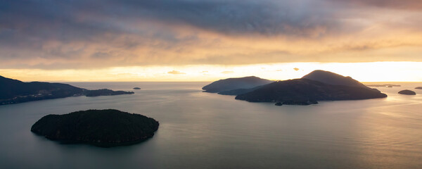 Islands in Howe Sound, West Coast of Pacific Ocean. Dramatic Sunset Sky. Aerial
