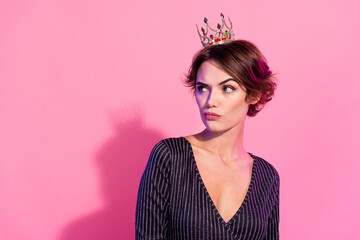 Photo of pretty suspicious lady wear glamour outfit crown looking empty space isolated pink color...