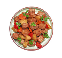 Plate with delicious goulash isolated on white, top view