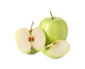 Whole and cut green apples isolated on white