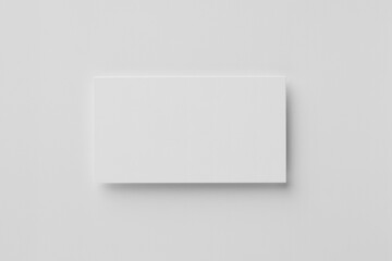 Blank business card on white background, top view. Mockup for design