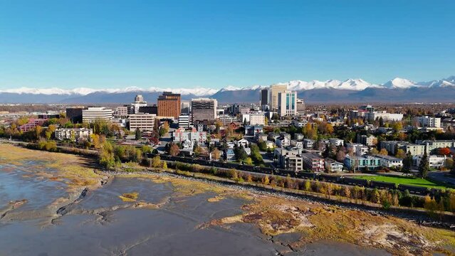 Train passing over Downtown Anchorage Fall aerial