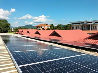 Installation of solar panels on the roof To help save on electricity bills within homes and office...