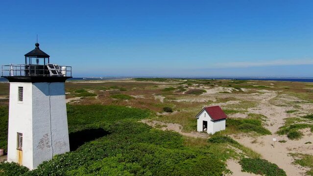 Aerial view of Cape Cod Provincetown beaches and lighthouses, multiple clips