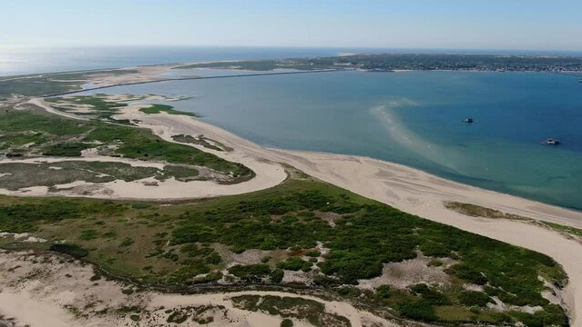 Aerial view of Cape Cod Provincetown beaches and lighthouses, multiple clips