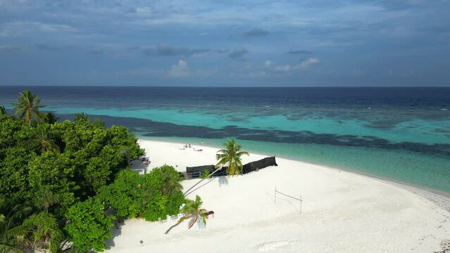 Close up aerial view of the white sands of Bikini Beach, Dhangethi, Maldives, Indian Ocean.