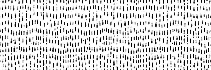Hand drawn small dash seamless pattern. Black grunge doodle stroke on white background. Abstract vector wallpaper, print. 
