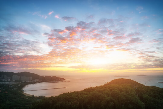 Aerial photography of the scenery of Sanya Island under sunset..