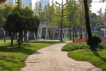 City park with grass and woods