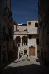 Stone mediaval houses in Polignano a Mare city with no people 