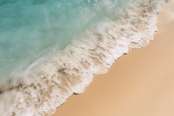 Fototapeta na wymiar brown sand beside body of water during daytime