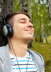 Happy Young Man in Headphones
