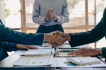 Thank you for letting me be part of the team. Cropped view of two businessmen shaking hands during meeting for success in job interview in business office Thank you partner, close-up photo - obrazy, fototapety, plakaty
