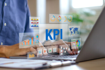 Businessmen using a computer to KPI,Key Performance Indicator Concept.banner web icon for business,...