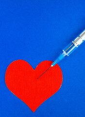 Syringe and Red Heart Shape