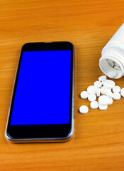 Pills and Phone closeup