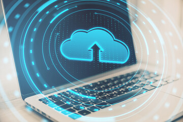 Close up of laptop with digital round cloud computing interface. Online storage and server concept. Double exposure. Double exposure.