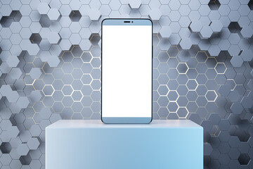 Close up of empty white mock up mobile phone with creative gray hexagonal background. Device...