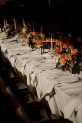 Stylish table setting with cutlery and eucalyptus leaves, top view. Space for text