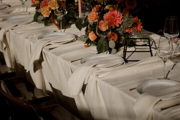 Stylish table setting with cutlery and eucalyptus leaves, top view. Space for text