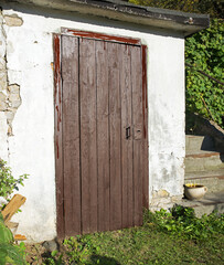 Old wooden door to a vintage dwelling