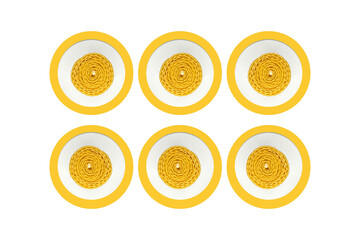 Pattern with a paraffin yellow twisted candle top view	