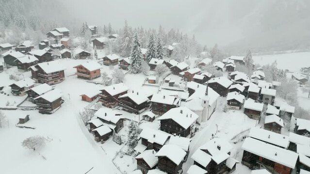 A small village with old huts in a blizzard. It is Blatten b. Naters in the canton of Valais in Switzerland