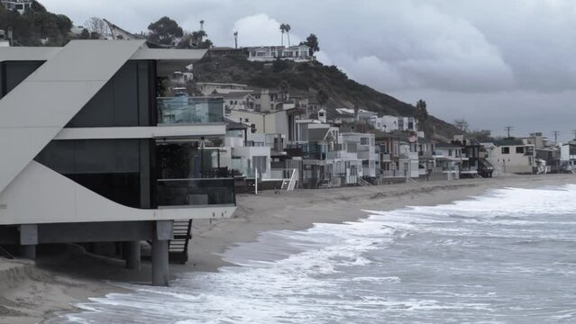 23.97 FPS Malibu California Coastline Day with Waves Left to right Pan