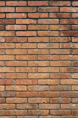 Old brickwork. Vertical photo. Wall texture.