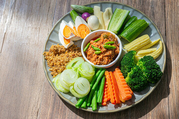 Naam Phrik Lohng Reuua With stir fried pork and seasoning add the dried shrimp, salted egg and pickled garlic  cucumbers, carrots, yardlong beans, ginger, baby corn, blanched Chinese cabbage, etc.