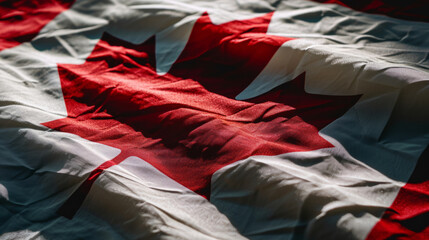 Flag of Canada. A beautifully folded flag featuring a red maple leaf