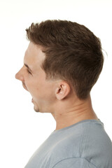 Obraz premium angry bearded man shouting on white studio background