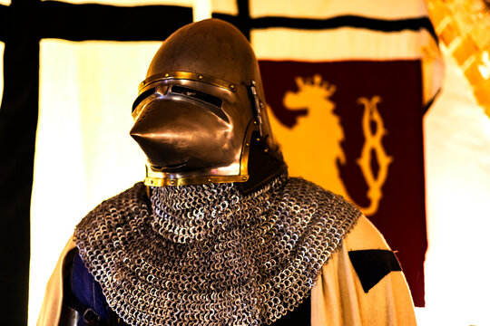 knightly armor of a German knight with a sword in his hand