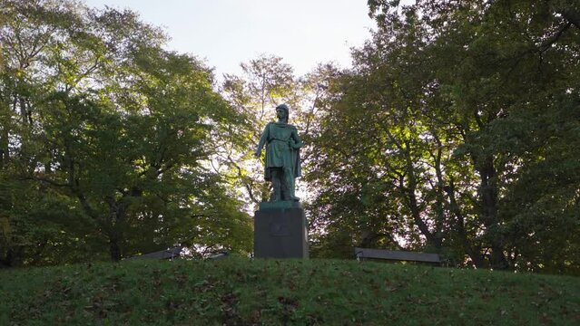 satue of Rollo the Viking located in alesund park during morning in slow motion