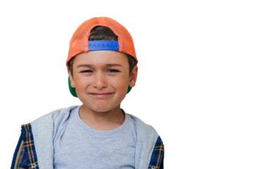 Confused little boy in baseball cap crying at hospital leans on wall, bad news. American toddler disappointed at home. Offended kid depressed after bullying at school. Childhood, upset emotion mockup.