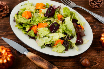 Autumn salad with pumpkin and beets.