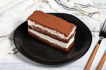 Tiramisu cake. Perfect homemade tiramisu cake on wooden background