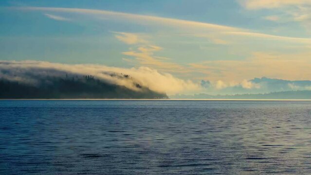 Clouds Gliding over Hat Island in the Morning