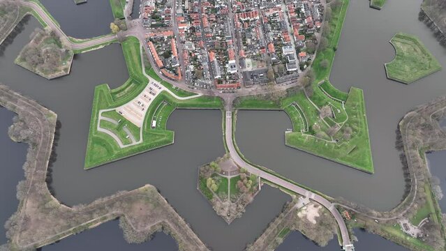 Aerial footage of the Oorlogsmonument Memorial Park and Naarden city in North Holland, Netherlands