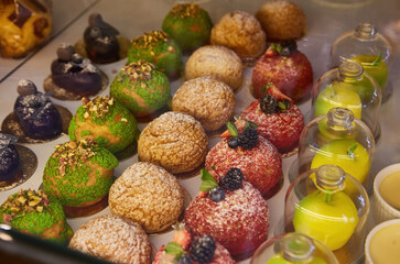 Pastry shop with variety of donuts, muffins, creme brulee