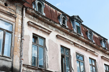 Old building. Ornaments on the walls of the building.