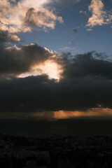 Obraz premium Sunlight Breaking Through the Clouds
