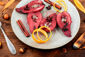 Sweet poached pears in red wine