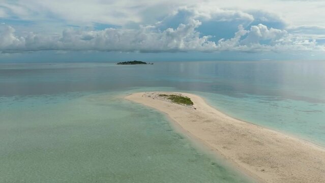 Tropical landscape with a beautiful beach. Timba Timba islet. Tun Sakaran Marine Park. Borneo, Sabah, Malaysia.