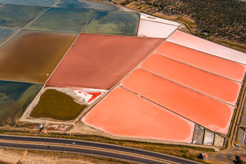 Aerial drone view of the evaporation salt pans in saltworks. Salt fields. Stone Salt Works