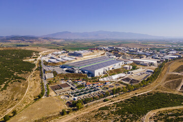 Sewage treatment plant aerial view, ponds for recycling dirty wastewater, in industrial park, city and industrial waste management