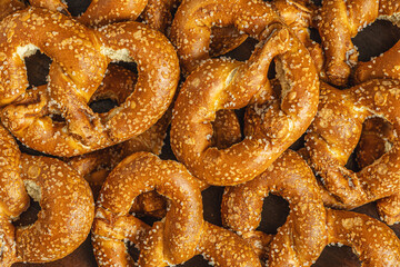 food background of pretzels on a wooden surface close up shallow depth of field