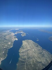 view from plane of coast and islands